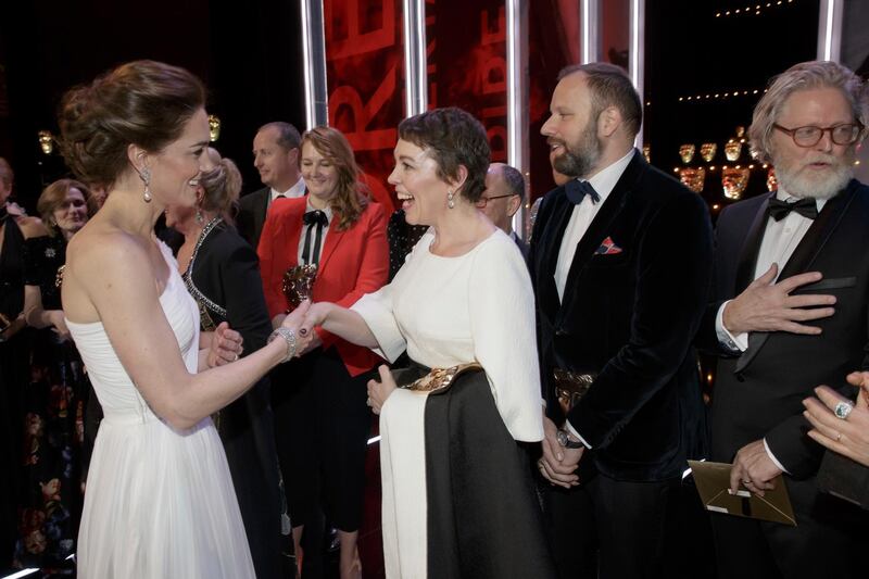 Catherine, Duchess of Cambridge meets Olivia Colman, director Yorgas Lanthimos and writer Tony McNamara after the Baftas 2019. AP