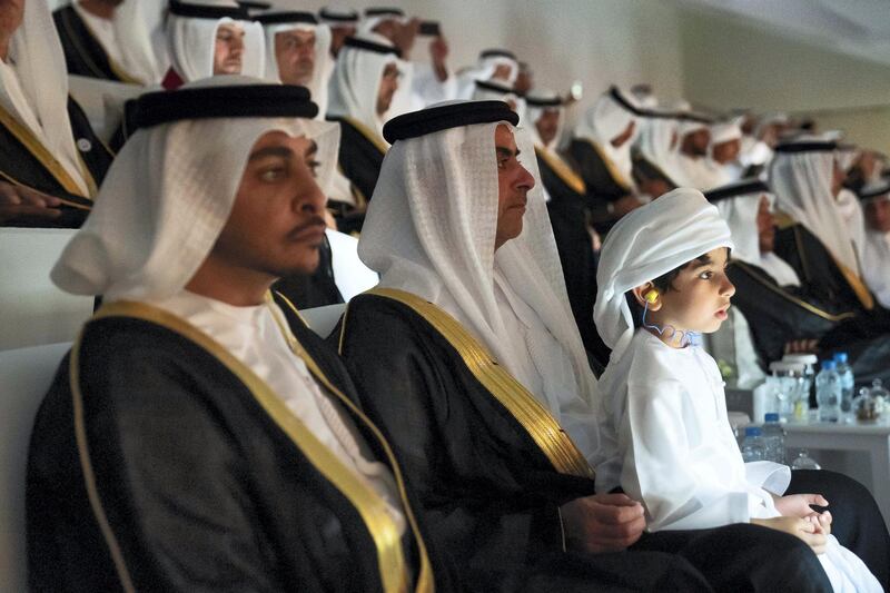 ABU DHABI, UNITED ARAB EMIRATES - December 02, 2018: HH Sheikh Khalifa bin Saif bin Zayed Al Nahyan (L), HH Lt General Sheikh Saif bin Zayed Al Nahyan, UAE Deputy Prime Minister and Minister of Interior (C) and HH Sheikh Issa bin Zayed Al Nahyan (L), watch a performance of ���This is Zayed, This is UAE' during the 47th UAE National Day celebrations, at Zayed Sports City.

( Mohamed Al Hammadi / Ministry of Presidential Affairs )
---