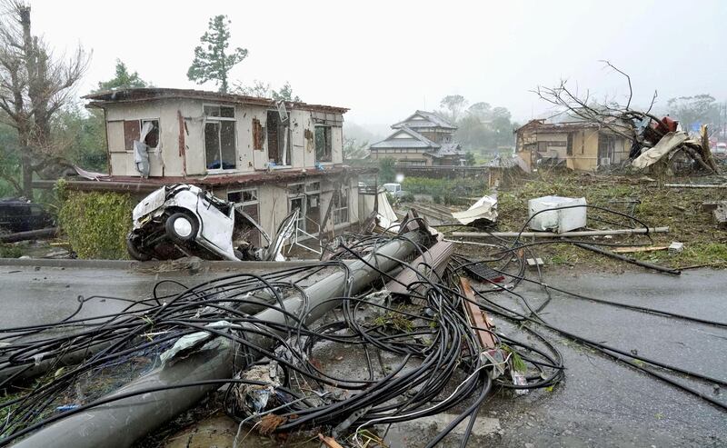 Destroyed houses, cars and power poles, which according to local media were believed to be caused by a tornado, are seen as Typhoon Hagibis approaches the Tokyo area in Ichihara, east of Tokyo, Japan. Reuters