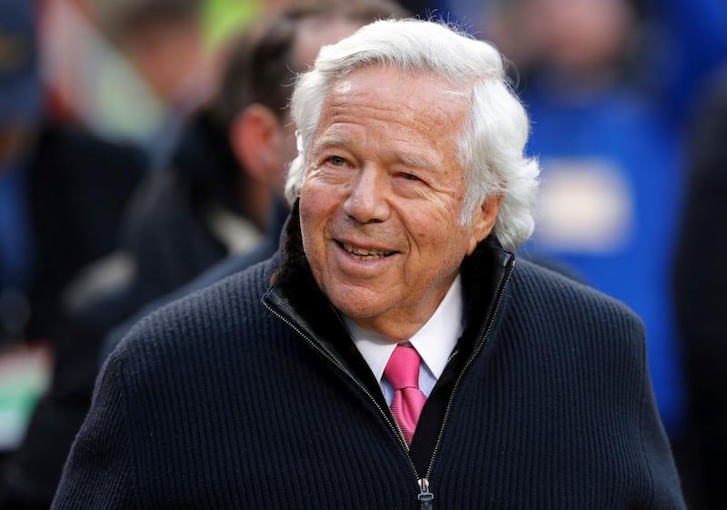 FILE - In this Jan. 20, 2019, file photo, New England Patriots owner Robert Kraft walks on the field before the AFC Championship NFL football game between the Kansas City Chiefs and the New England Patriots, in Kansas City, Mo. Police in Florida have charged New England Patriots owner Robert Kraft with misdemeanor solicitation of prostitution, saying they have videotape of him paying for a sex act inside an illicit massage parlor.  Jupiter police told reporters Friday, Feb. 22, 2019, that the 77-year-old Kraft has not been arrested. (AP Photo/Charlie Neibergall, File)