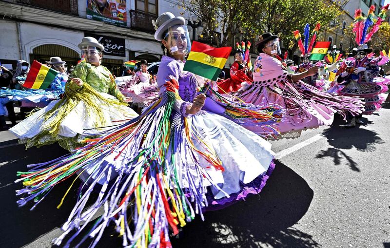 Dancers in La Paz, Bolivia, perform the Andean folk dance Morenada to celebrate the 20th anniversary of the declaration of Oruro's carnival as one of Unesco's Masterpieces of the Oral and Intangible Heritage of Humanity. AFP