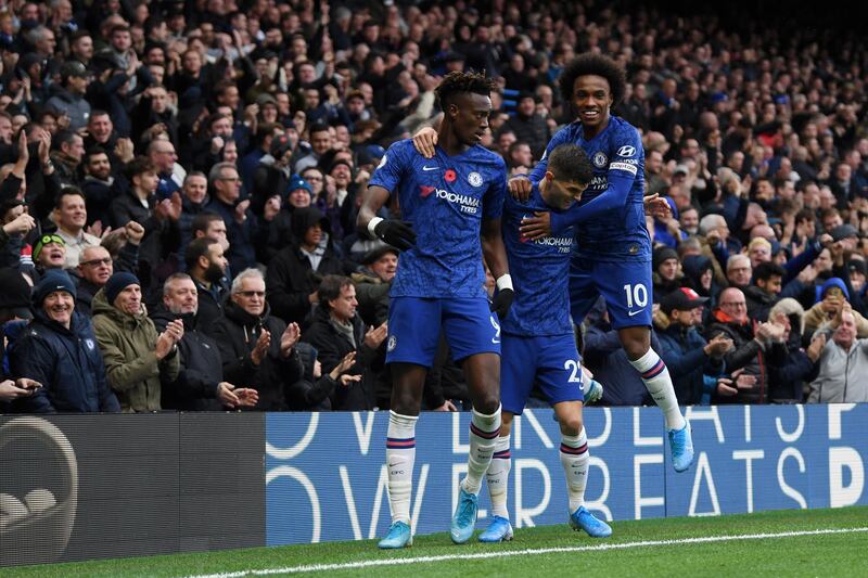 Tammy Abraham celebrates scoring with Christian Pulisic and Willian. Getty Images