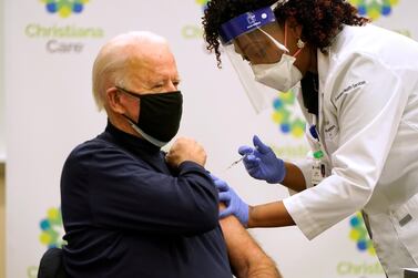 US President Joe Biden receives a Covid-19 vaccination in December 2020. Getty Images