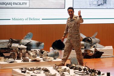 Saudi military spokesman Col. Turki Al Malki displays what he describes as an Iranian cruise missile and drones used in an attack this weekend that targeted the heart of Saudi Arabia's oil industry, during a press conference in Riyadh, Saudi Arabia, Wednesday, Sept. 18, 2019. AP Photo/Amr Nabil