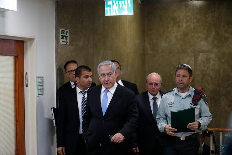Israeli Prime Minister Benjamin Netanyahu arrives to the weekly cabinet meeting in Jerusalem, Sunday, June 2, 2019. (Ronen Zvulun, Pool via AP)