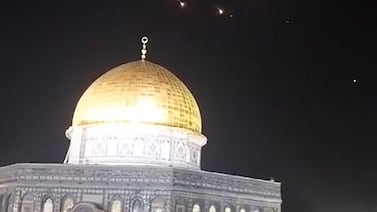 A video still from early on Sunday shows rocket trails above Al Aqsa Mosque compound in occupied East Jerusalem's Old City. AFP