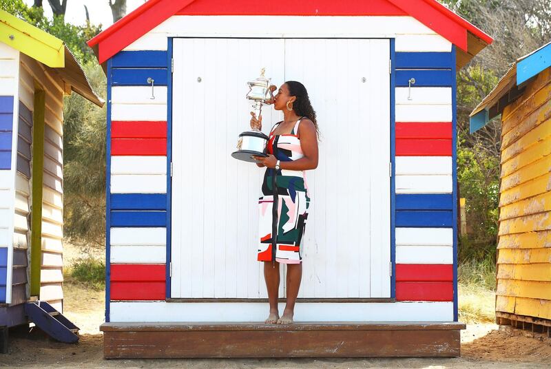 MELBOURNE, AUSTRALIA - JANUARY 27:  Naomi Osaka of Japan poses with the Daphne Akhurst Memorial Cup during the Women's Australian Open media opportunity at Brighton Beach on January 27, 2019 in Melbourne, Australia. (Photo by Julian Finney/Getty Images) *** BESTPIX ***