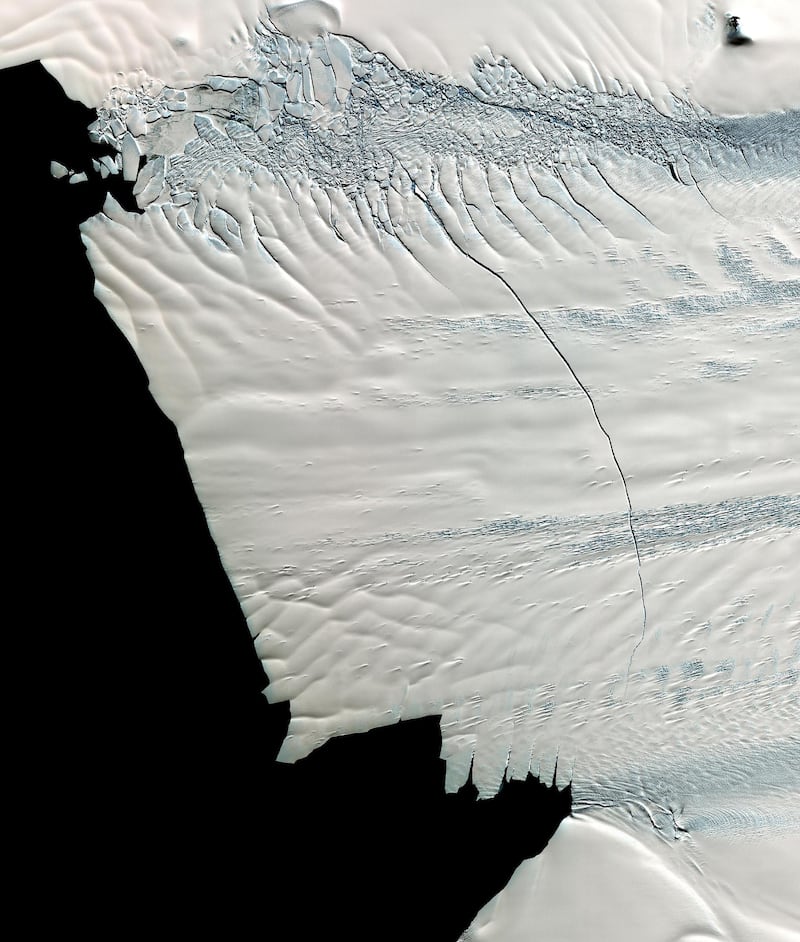 This image from NASA's Terra spacecraft shows a massive crack across the Pine Island Glacier, a major ice stream that drains the West Antarctic Ice Sheet. Eventually, the crack will extend all the way across the glacier.