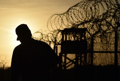 A US soldier walks near Guantanamo Bay prison in Cuba. AFP