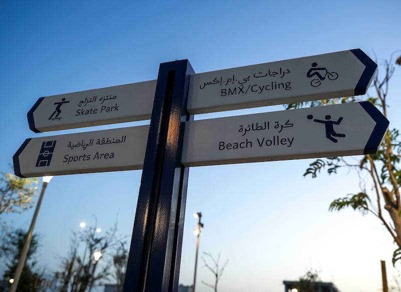 A sign at the park points to the different recreational areas