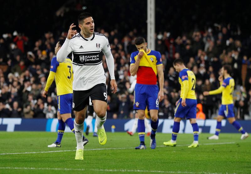 Fulham's Aleksandar Mitrovic celebrates scoring their first goal against Southampton. Reuters