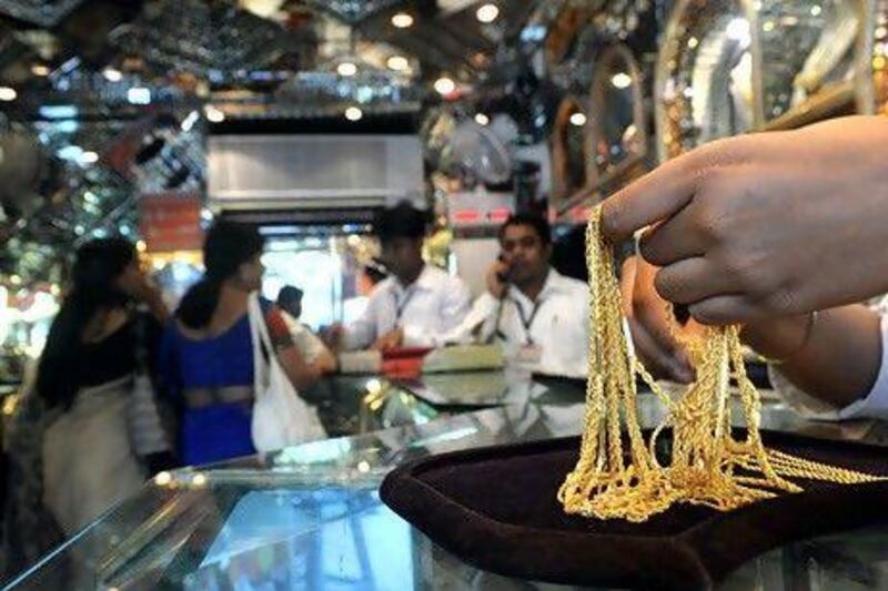 The festival season in India, which started this month, is normally a peak period for gold demand. AFP