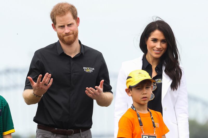 Prince Harry and Meghan during the JLR Drive Day Getty