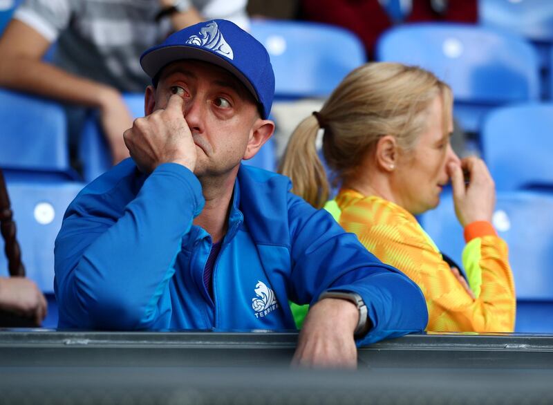 Huddersfield Town fans look dejected during the match. Reuters