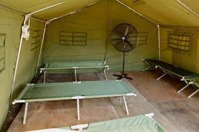 An undated photo obtained from the Department of Immigration and Border Protection on February 18, 2014 shows the interior of a tent at Australia's regional processing centre on Manus Island in Papua New Guinea.   One person was killed and 77 injured during a second night of rioting at an Australian immigration detention centre on Papua New Guinea's Manus Island, officials said on February 18.  AFP PHOTO / DEPARTMENT OF IMMIGRATION AND BORDER PROTECTION"   ----EDITORS NOTE ----RESTRICTED TO EDITORIAL USE MANDATORY CREDIT " AFP PHOTO / DEPARTMENT OF IMMIGRATION AND BORDER PROTECTION" NO MARKETING NO ADVERTISING CAMPAIGNS - DISTRIBUTED AS A SERVICE TO CLIENTS (Photo by Dep Immigration & Border Protect / Dep Immigration & Border Protect / AFP)