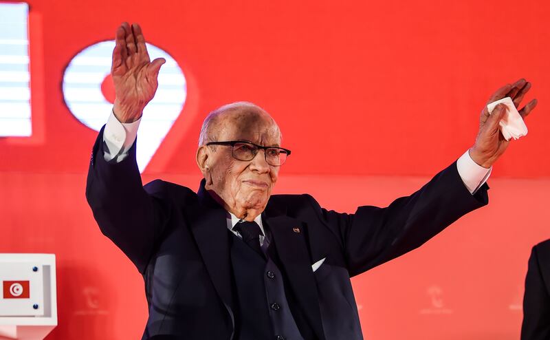 Tunisian President Beji Caid Essebsi waves to his supporters during the launch of his party Nidaa Tounes' congress in the coastal city of Monastir, about 160 kilometres south of the capital Tunis, on April 6, 2019.  / AFP / FETHI BELAID
