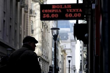 A currency exchange board in Buenos Aires as the peso hit a record low on August 12, 2019. AP