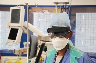 The augmented reality technology can be worn in conjuction with existing PPE. Courtesy Microsoft