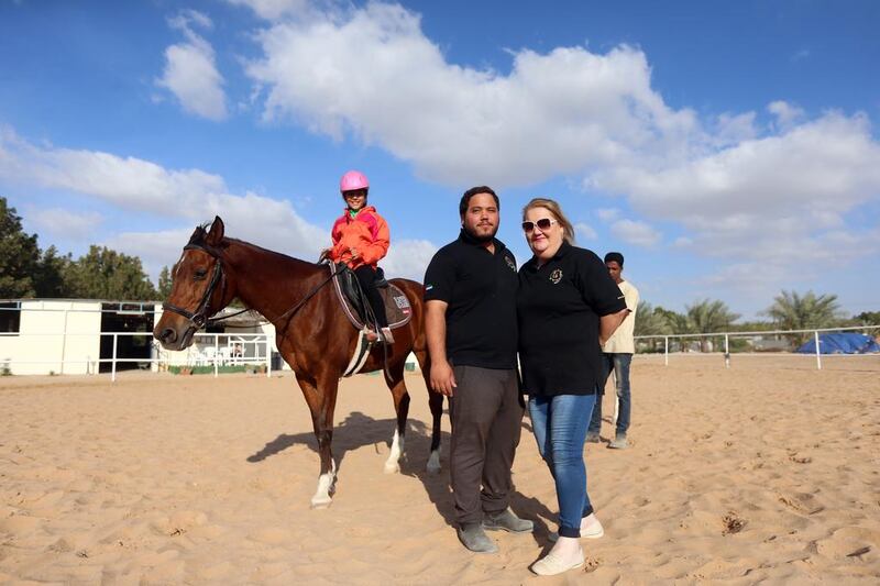 Tina Al Qubaisi and her son Khaled at the Dhabian Equestrian Club in Abu Dhabi. Satish Kumar / The National