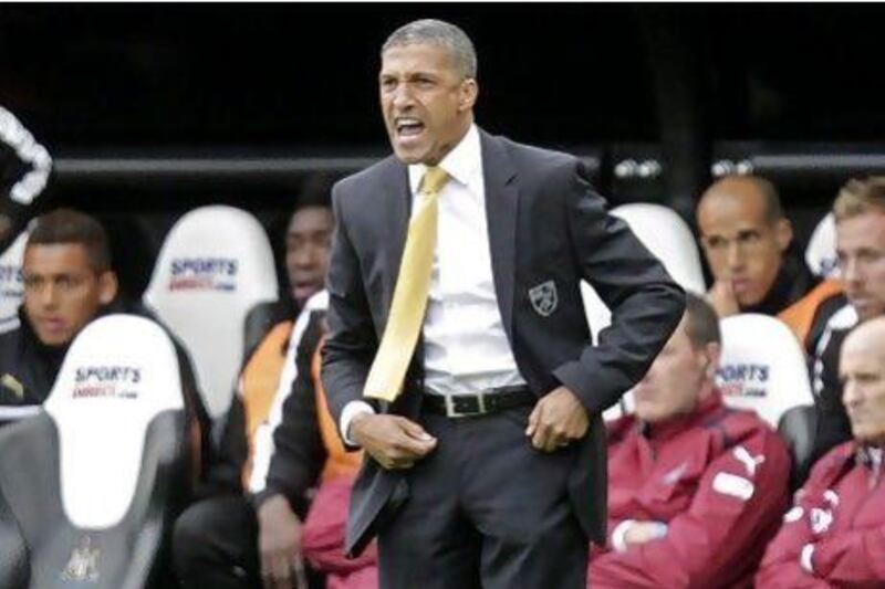 Manager Chris Hughton, centre, is asking his Norwich City side to find inspiration when they travel to Stamford Bridge to face the Premier League leaders, Chelsea.