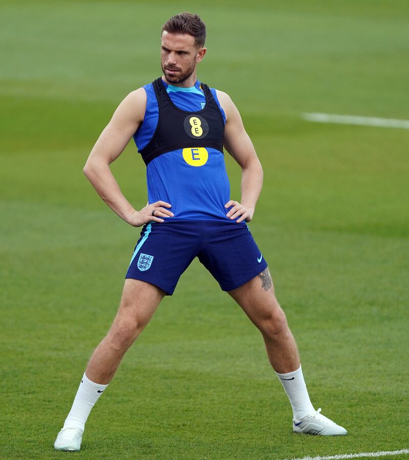 England's Jordan Henderson stretched during training. PA