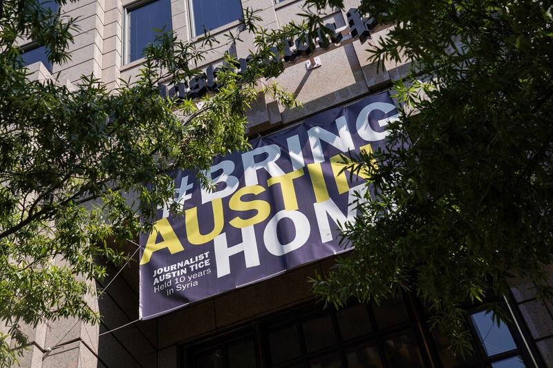A 'BringAustinHome' banner honouring Tice hangs outside a building in Washington. Reuters