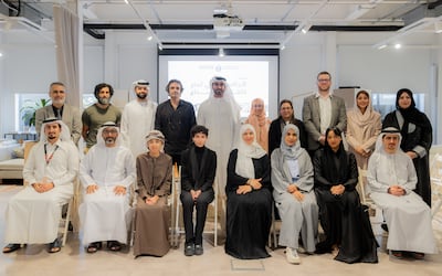 Mubarak Al Nakhi, Undersecretary of the Ministry of Culture, standing centre, with the committee and recipients of the first grant programme. Photo: Ministry of Culture

