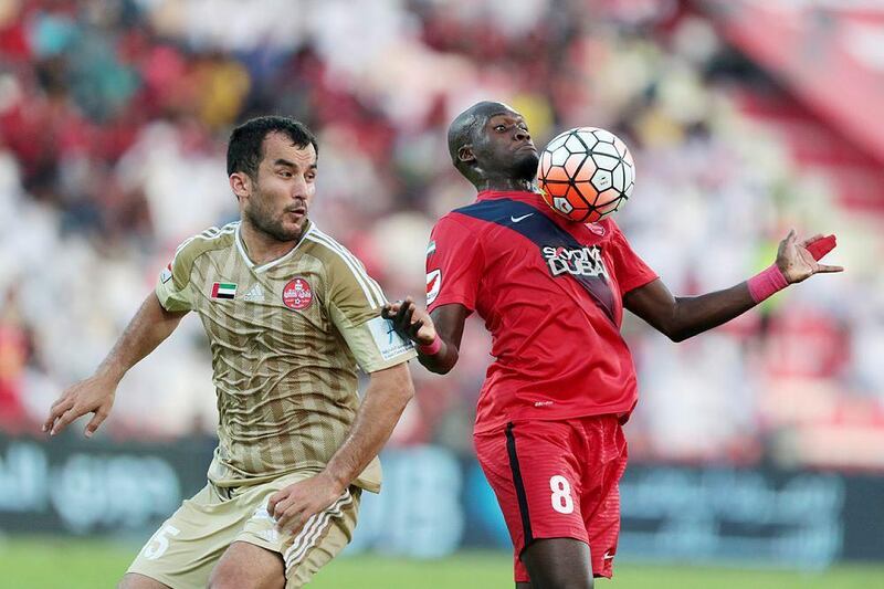 Moussa Sow of Al Ahli controls the ball against Al Shaab in their Arabian Gulf League contest on Sunday. Christopher Pike / The National / May 8, 2016