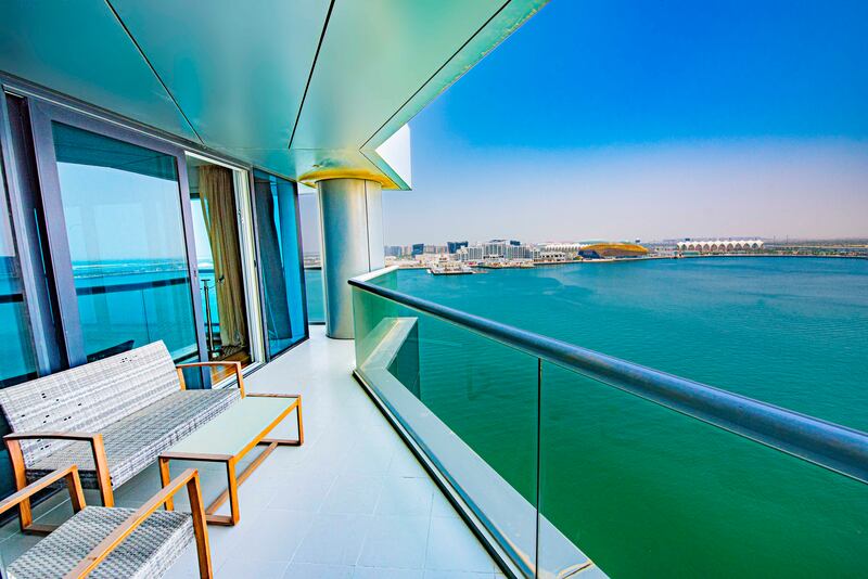 There is plenty of balcony space with water views for dining outside