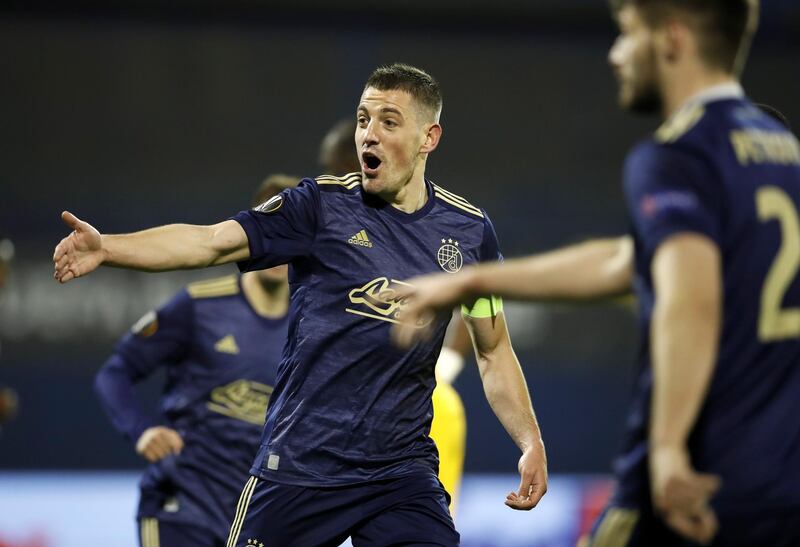 Arijan Ademi - 8, Put in a spirited performance and was seemingly everywhere on the pitch, even in extra time. It was such a commanding display from the captain. EPA