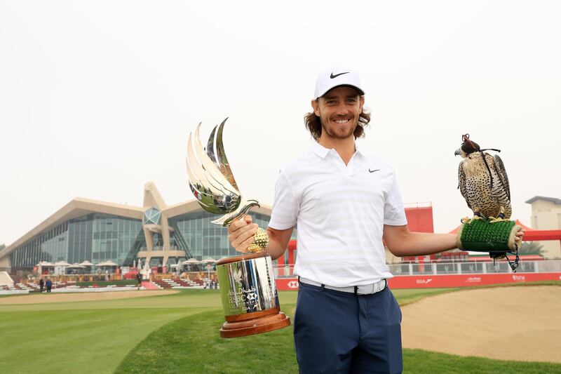 Defending champion Tommy Fleetwood poses with a falcon and the Falcon Trophy ahead of the Abu Dhabi HSBC Championship. Andrew Redington / Getty Images