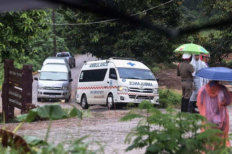 An ambulance leaves the Tham Luang cave area as the operations continue for those still trapped inside the cave. AFP