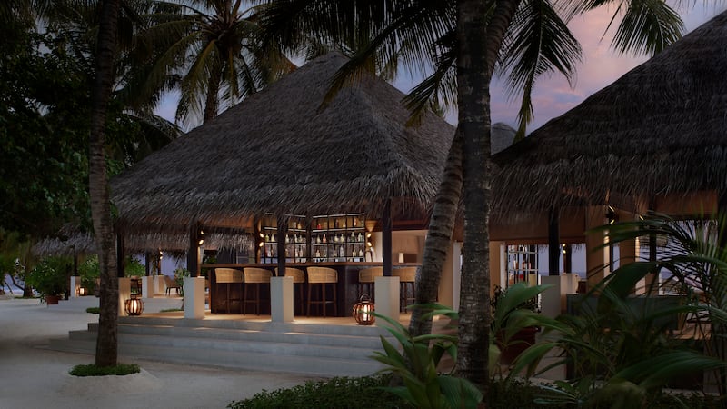 Dhoni Bar on the beach is nestled among palm trees