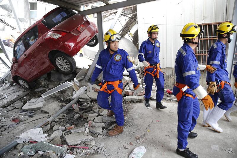 Tainan Mayor Lai Ching-te said on Sunday there were an estimated 124 people still trapped, many at the bottom of the wreckage. Wally Santana / AP
