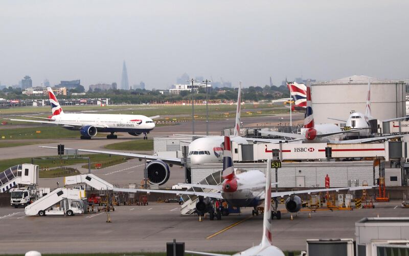 FILE PHOTO: British Airways planes at Heathrow Terminal 5 in London, Britain, May 27, 2017. REUTERS/Neil Hall/File Photo