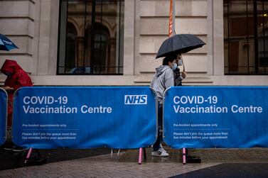  People queue for Covid-19 vaccines in London. A rise in new UK cases throws into question plans to further lift lockdown measures in mid-June. Getty Images