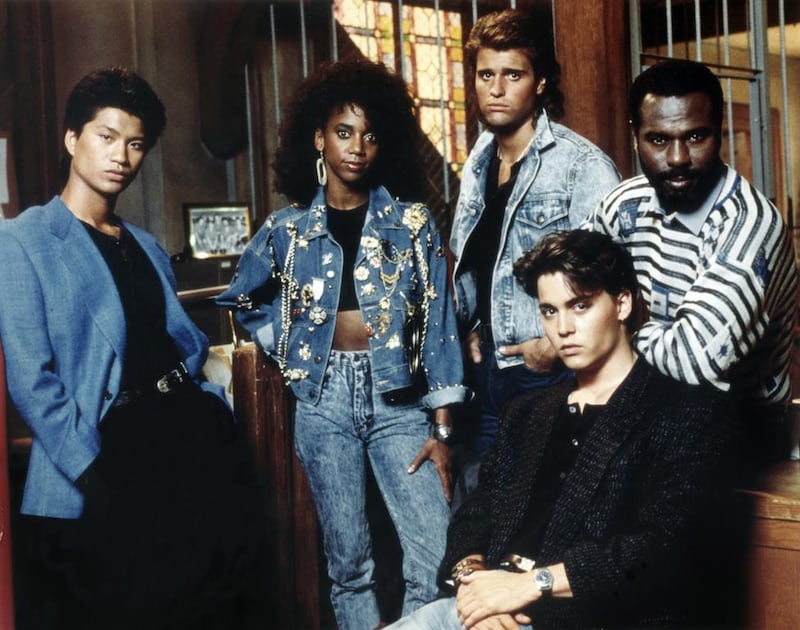 The cast of 21 Jump Street, including Johnny Depp seated. CinemaPhoto / Corbis