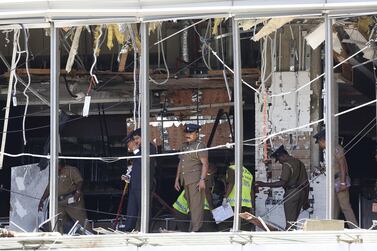 Police at the scene of the Easter Sunday ISIS suicide bombing of the Shangri-La Hotel in Colombo, Sri Lanka, in 2019. EPA