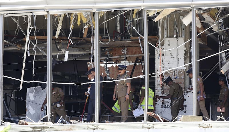 epa07519018 Sri Lankan police investigate the scene after an explosion hit Shangri-La Hotel in Colombo, Sri Lanka, 21 April 2019. According to the news reports at least 138 people killed and over 400 injured in a series of blasts during the Easter Sunday service at St Anthony's Church in Kochchikade,Shangri-La Hotel and Kingsbury Hotel with many more places.  EPA/M.A. PUSHPA KUMARA