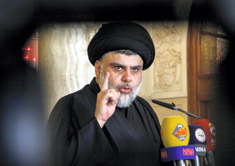 Iraqi Shiite leader and cleric Moqtada al-Sadr delivers a speech to his supporters following Friday prayers at the grand mosque of Kufa in the central Iraqi shrine city, some 160 kilometres south of the capital Baghdad, on September 21, 2018. (Photo by Haidar HAMDANI / AFP)