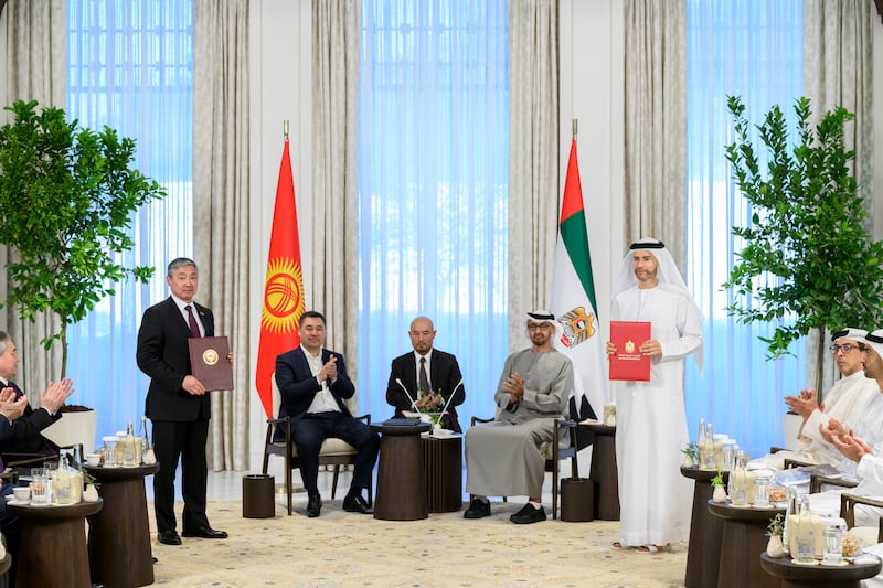 President Sheikh Mohamed and Mr Japarov witness an MOU exchange ceremony at Al Shati Palace. Seen with Mohamed Al Hussaini, UAE Minister of State for Financial Affairs, and Almaz Baketaev, Minister of Finance.