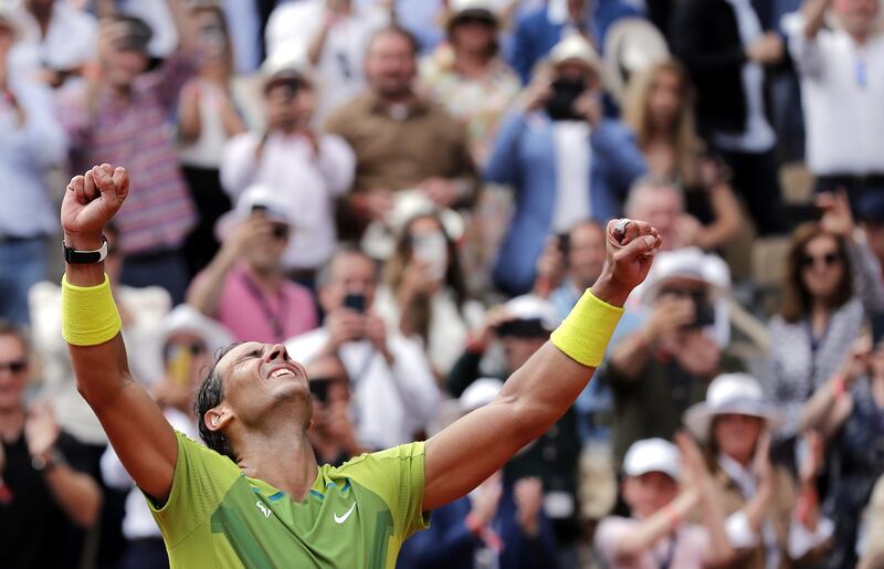 Spaniard Rafael Nadal celebrates after beating Casper Ruud of Norway to win the French Open for a 14th time at Roland Garros in Paris on June 5, 2022. EPA