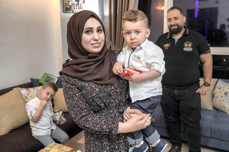 DUBAI UNITED ARAB EMIRATES. 07 DECEMBER 2020.  Five year old Adam Sadlah, who was suffering from a complex congenital heart abnormalitie, was saved by surgeons in Abu Dhabi after they operated and installed a 3D model of his failing organ. Father Mohamed Sadlah and his wife Areej Adas along with their first born son Anas Sadla. (Photo: Antonie Robertson/The National) Journalist: Janice Rodrigues. Section: National.