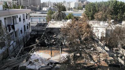 The aftermath of a fire in a house divided into sublet rooms, in Maysaloon, Sharjah. Reem Mohammed/The National