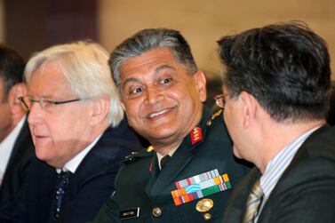 Abhijit Guha, centre, a retired Lieutenant General from the Indian Army, will be the next leader of the UN observer mission in Yemen's Red Sea port city of Hodeidah.