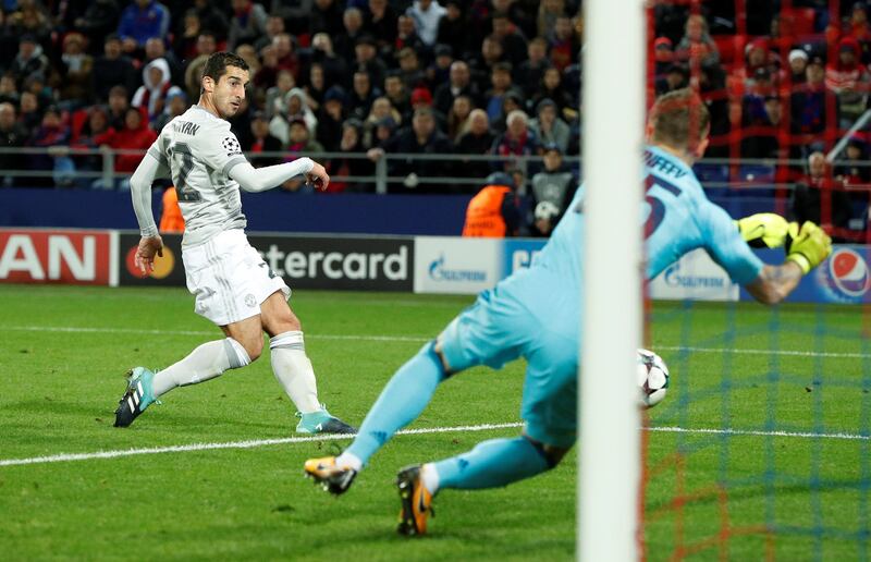 Manchester United's Henrikh Mkhitaryan scores their fourth goal. John Sibley / Reuters