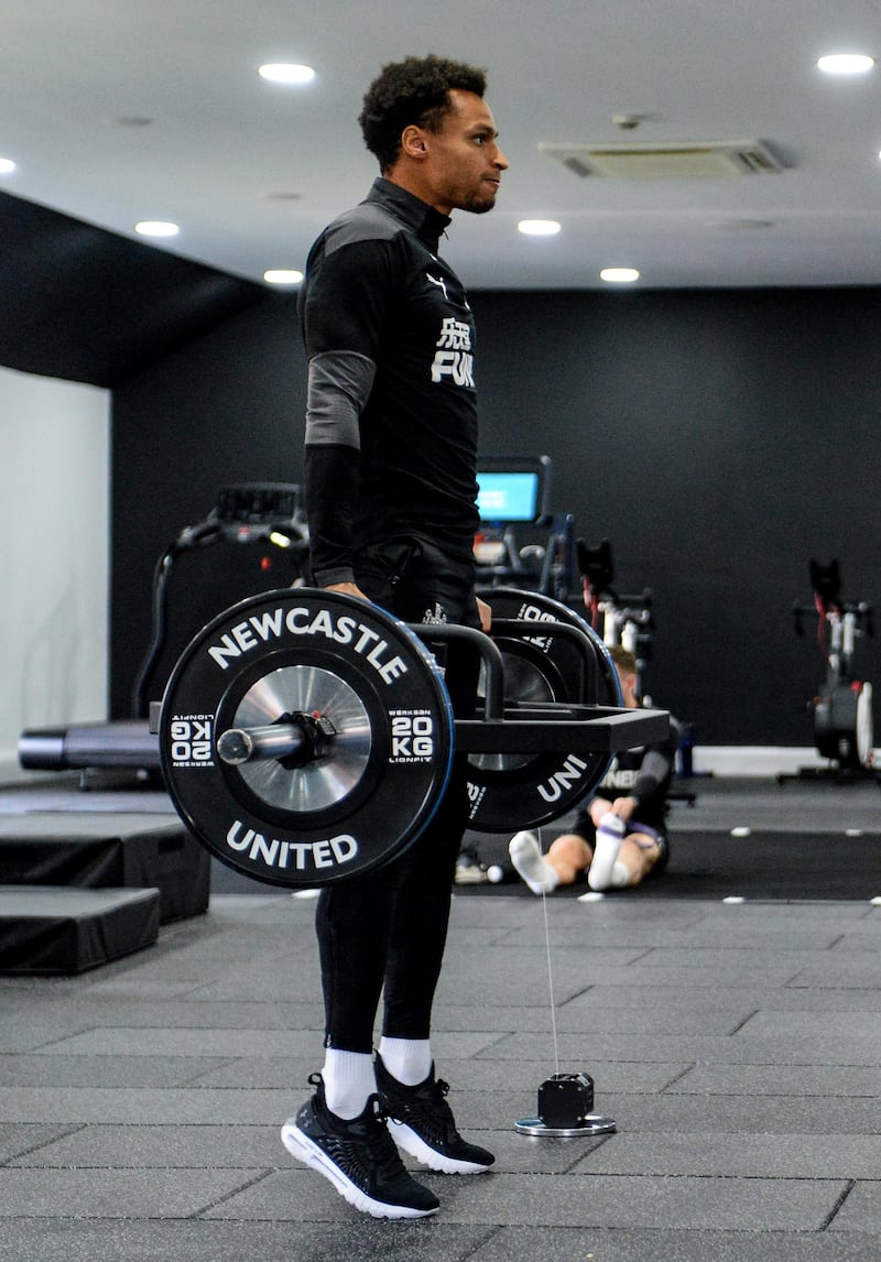 NEWCASTLE UPON TYNE, ENGLAND - APRIL 09: Jacob Murphy lifts weights during the Newcastle United Training Session at the Newcastle United Training Centre  on April 09, 2021 in Newcastle upon Tyne, England. (Photo by Serena Taylor/Newcastle United via Getty Images)