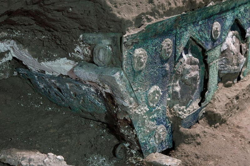 The chariot was discovered in a porch in front of a stable where, in 2018, the remains of three horses were found. AFP