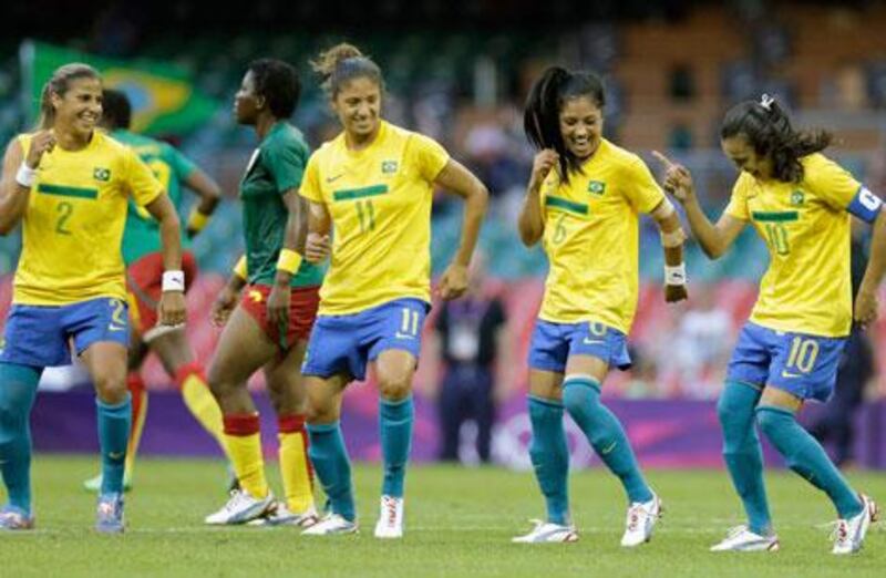 Marta leads Brazil's celebrations after scoring against Cameroon at Cardiff's Millennium Stadium