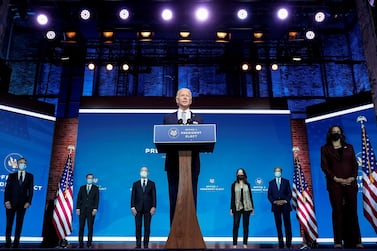 US President-elect Joe Biden stands with his nominees for his national security team at his transition headquarters in the Queen Theatre in Wilmington, Delaware, November 24, 2020. Reuters